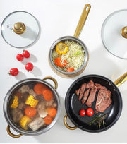 Assorted cookware with food on a white background